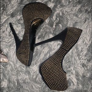 Gold and black heels